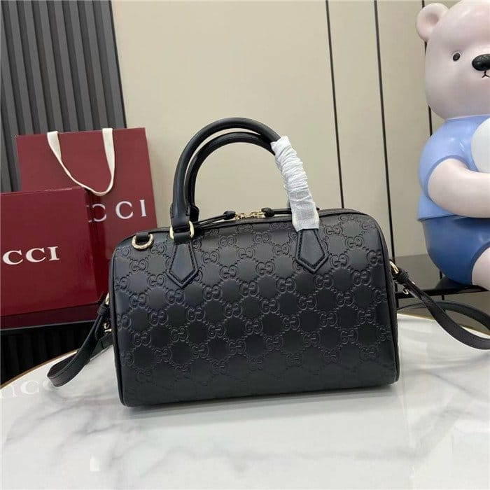 GUCCI 구찌 GG 엠보스 더플백 848886